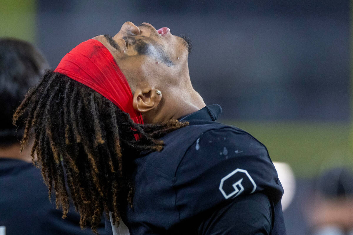 UNLV Rebels quarterback Doug Brumfield (2) throws his head back on the sidelines the Fresno Sta ...