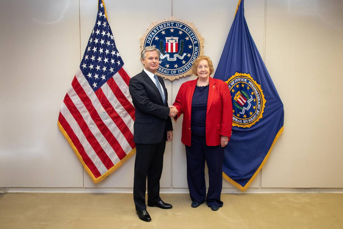 FBI Director Christopher Wray and former FBI Special Agent Susan Malone (Federal Bureau of Inve ...