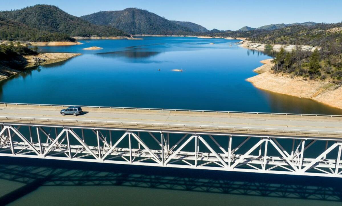 A car crosses Enterprise Bridge over Lake Oroville on Sunday, March 26, 2023, in Butte County, ...