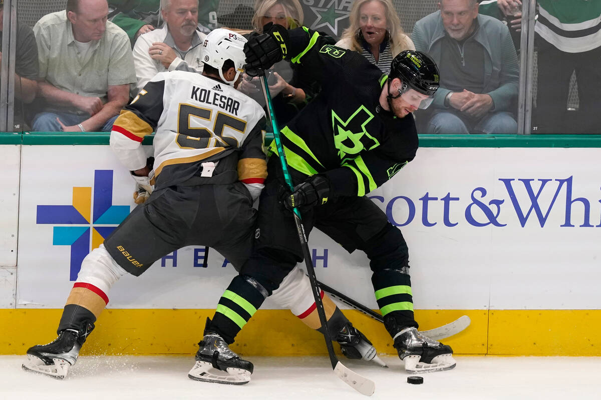 Dallas Stars center Radek Faksa (12) and Vegas Golden Knights right wing Keegan Kolesar (55) vi ...