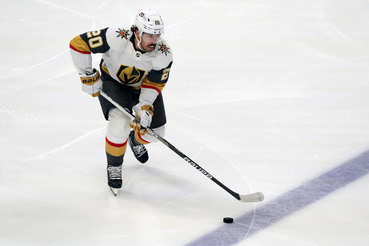 Vegas Golden Knights center Chandler Stephenson (20) skates with he puck during the third perio ...