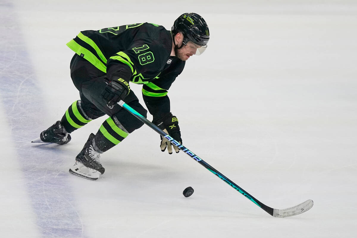 Dallas Stars center Max Domi (18) skates for the puck during the second period of an NHL hockey ...