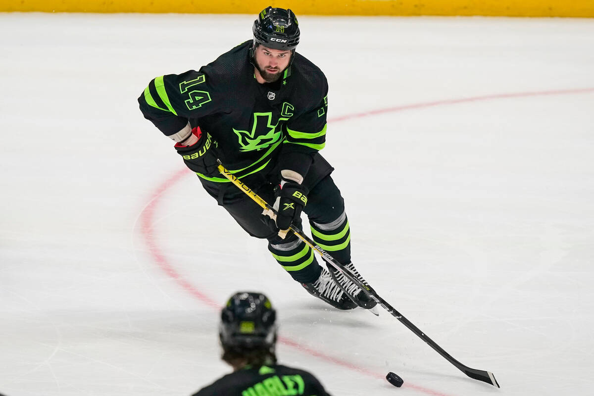 Dallas Stars left wing Jamie Benn (14) skates for the puck during the third period of an NHL ho ...
