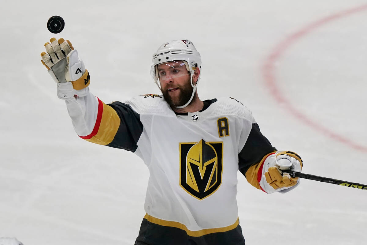 Vegas Golden Knights defenseman Alex Pietrangelo (7) reaches for the puck during the third peri ...