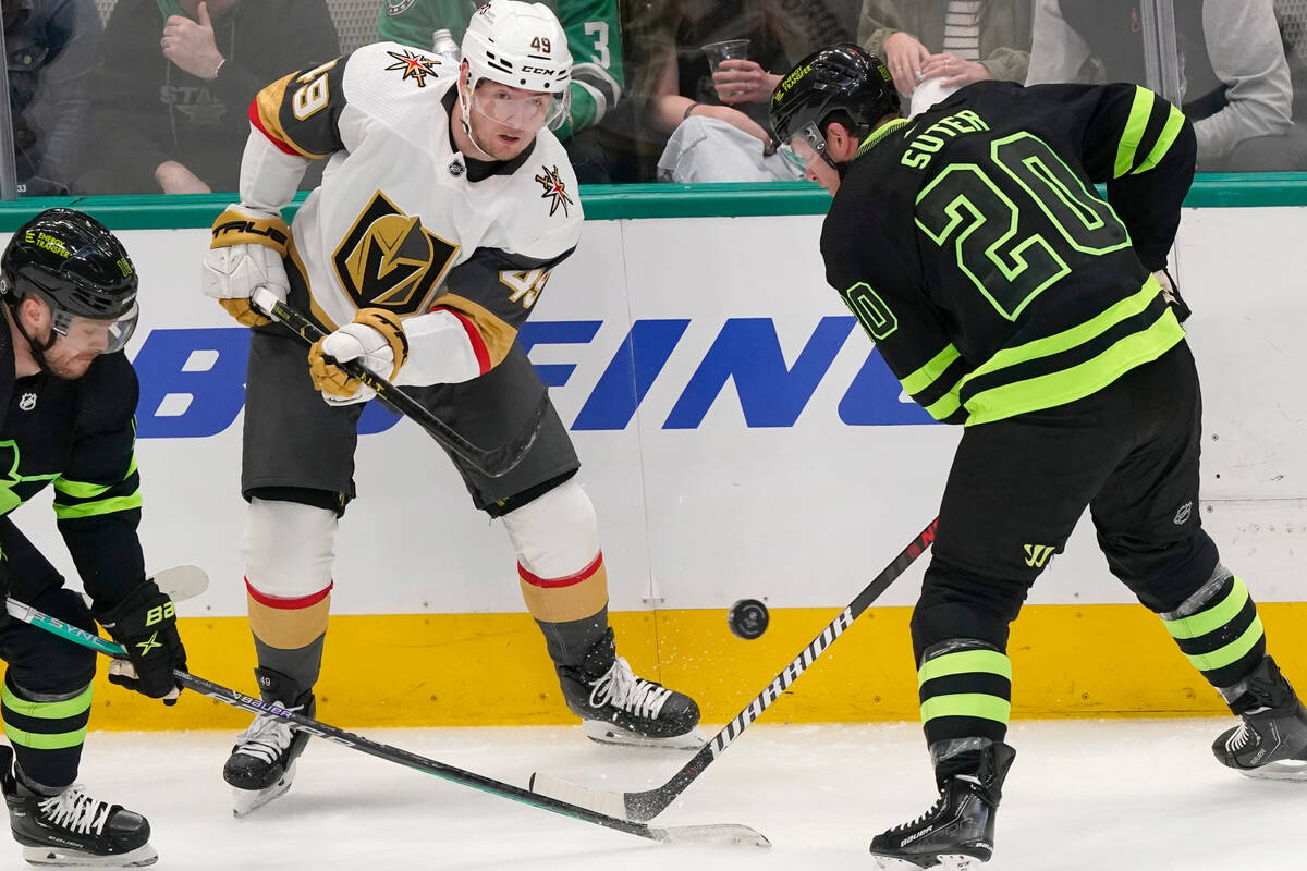 Vegas Golden Knights center Ivan Barbashev (49) moves the puck against Dallas Stars defenseman ...