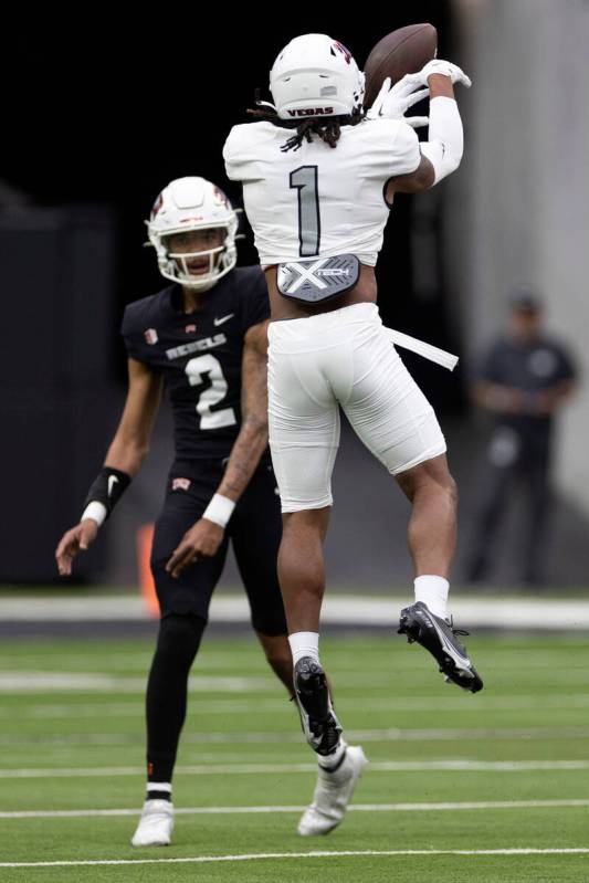 Defensive back Jalen Frazier (1) knocks down a pass by quarterback Doug Brumfield (2) during th ...