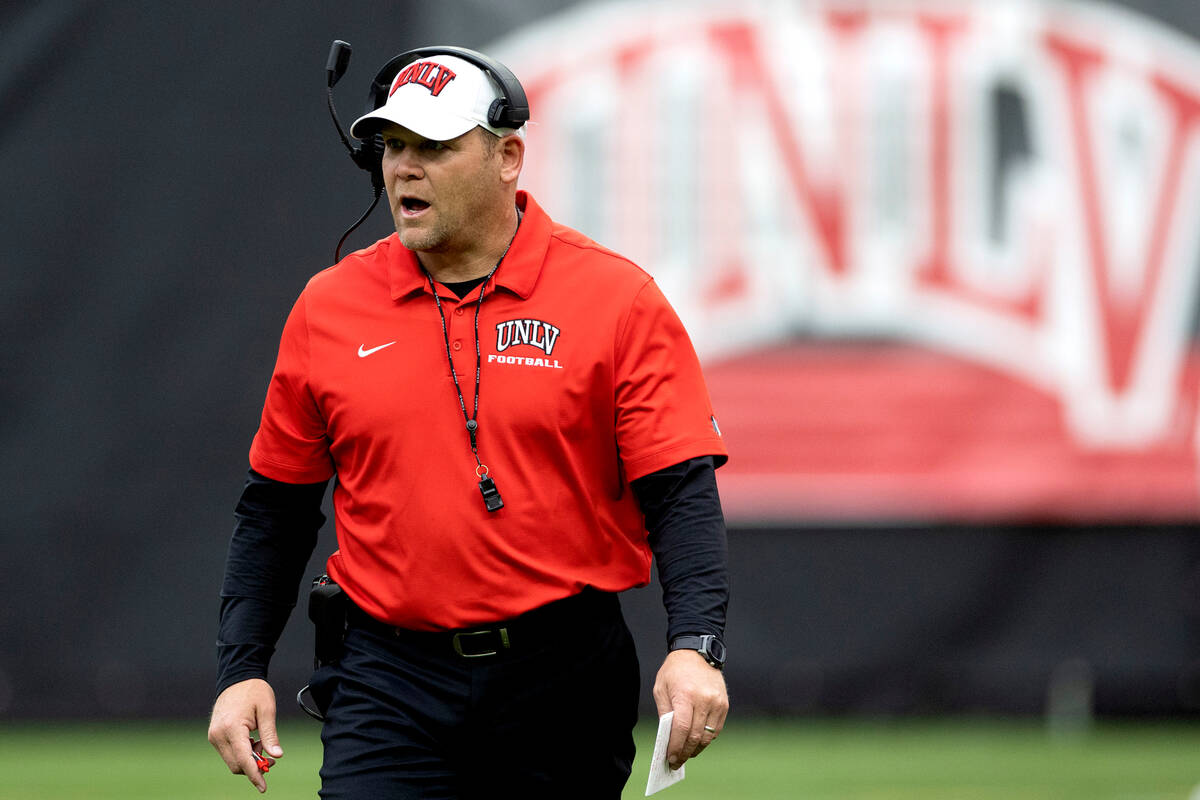 Head coach Barry Odom shouts from the field during the UNLV spring showcase game at Allegiant S ...