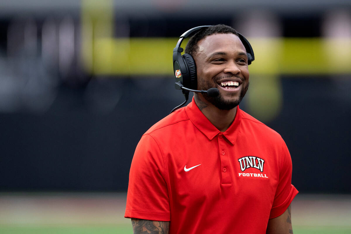 Offensive coordinator Brennan Marion laughs from the sidelines during the UNLV spring showcase ...