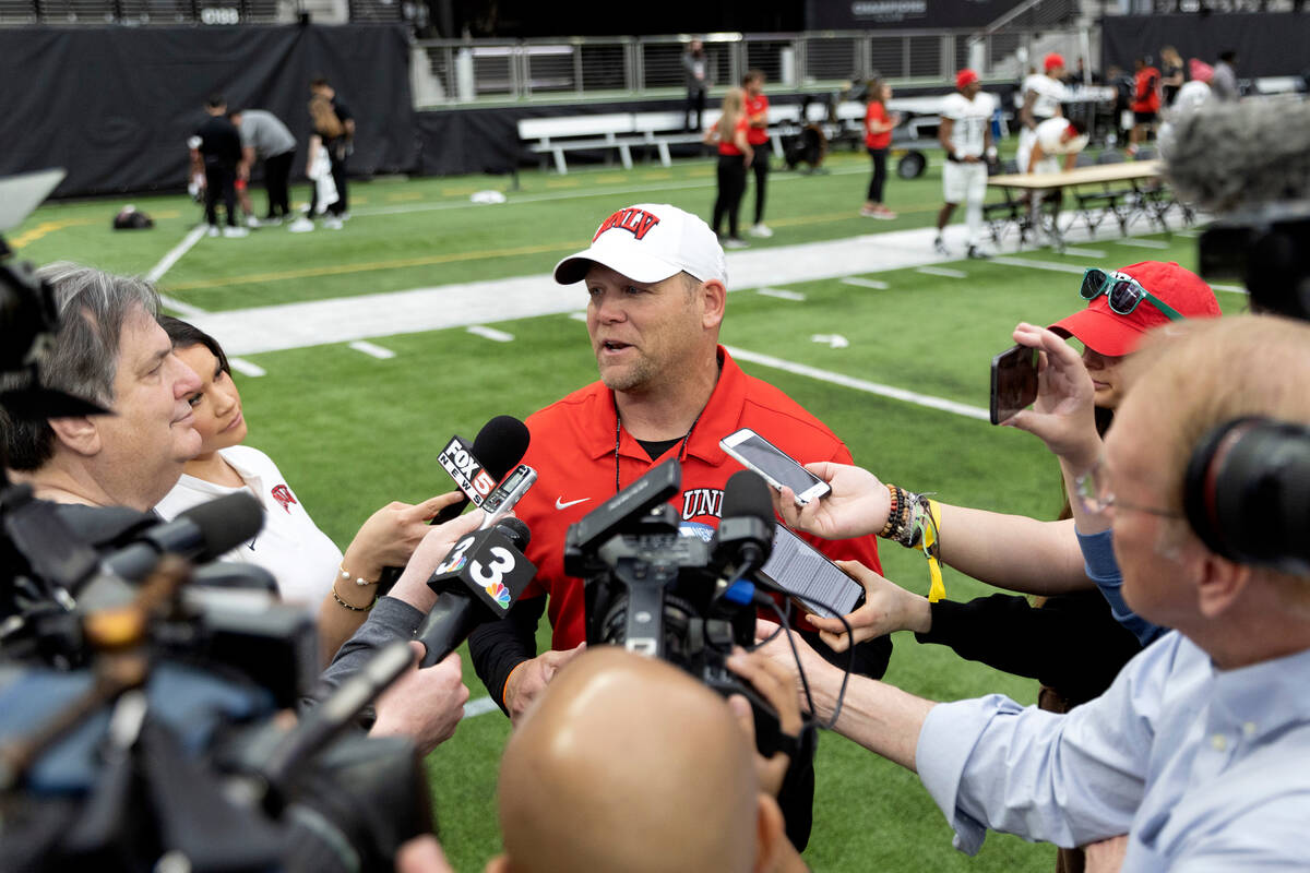 Head coach Barry Odom speaks to the press after the UNLV spring showcase game at Allegiant Stad ...