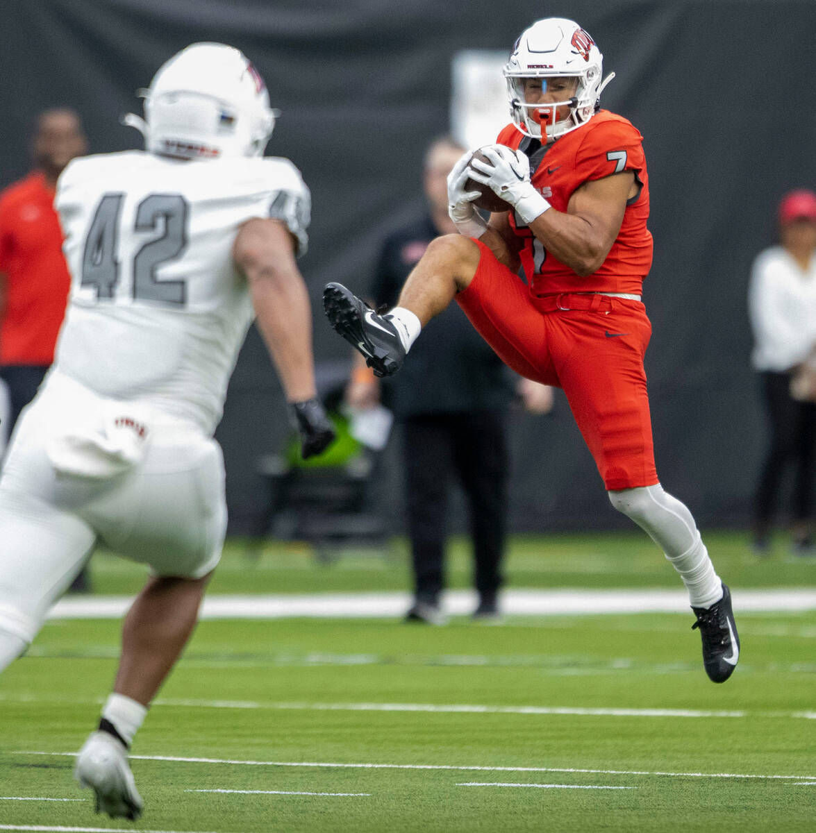 UNLV wide receiver Jacob De Jesus (7) makes a catch during the first half of a scrimmage for th ...
