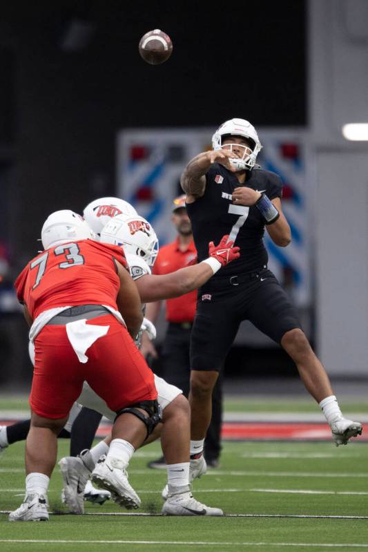 UNLV quarterback Cameron Friel (7) makes a throw during the first half of a scrimmage for the t ...