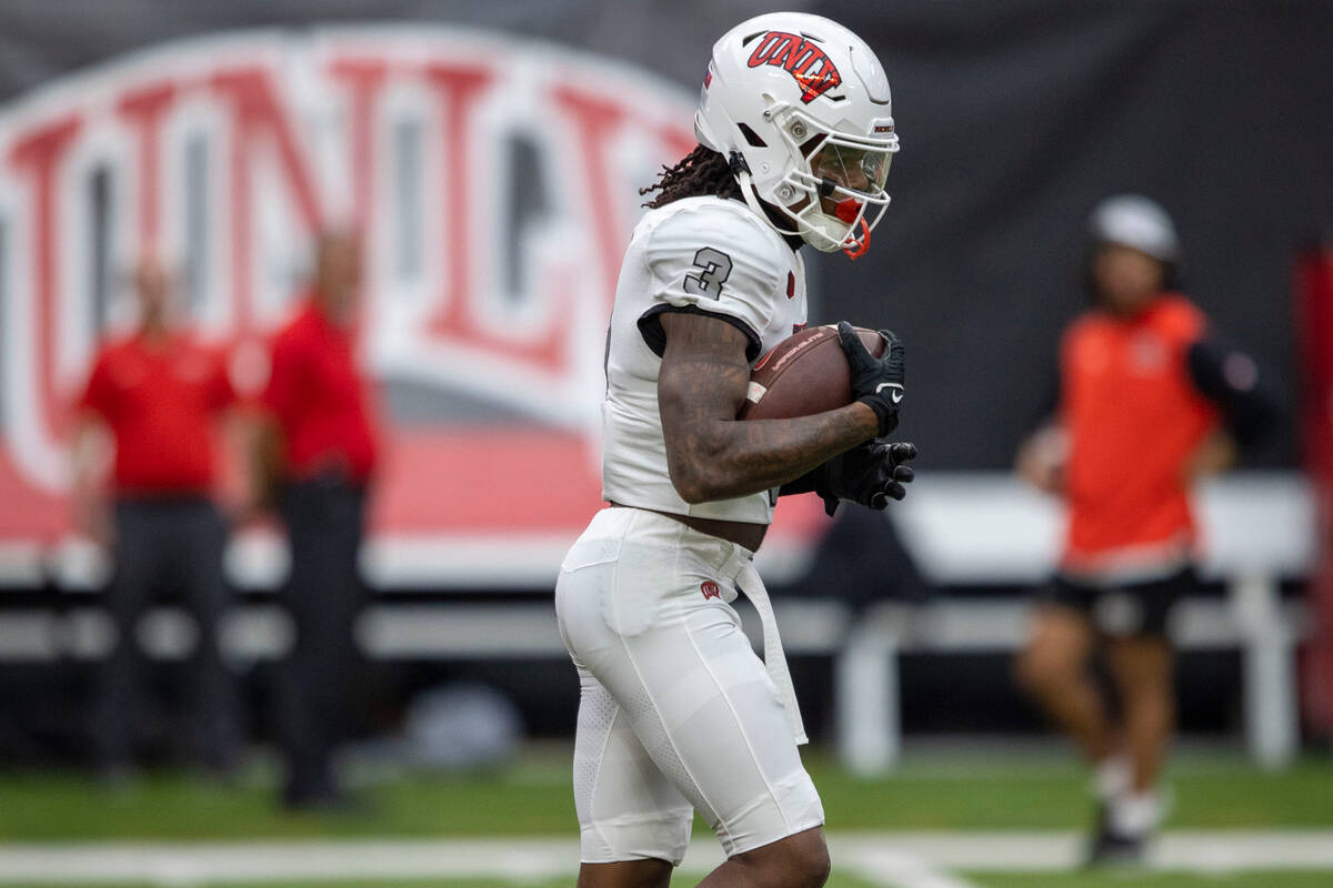 UNLV defensive back Johnathan Baldwin (3) holds onto the football after a play during the first ...