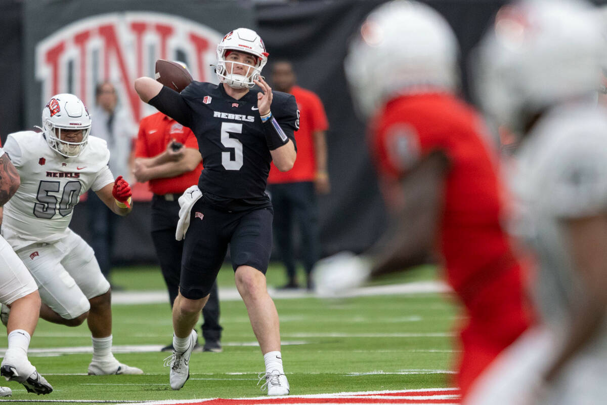 UNLV quarterback Harrison Bailey (5) throws during the first half of a scrimmage for the team&# ...