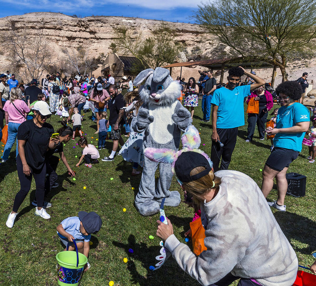 The Easter Bunny enjoys the moment as parents and their children ages 1-3 participate in their ...