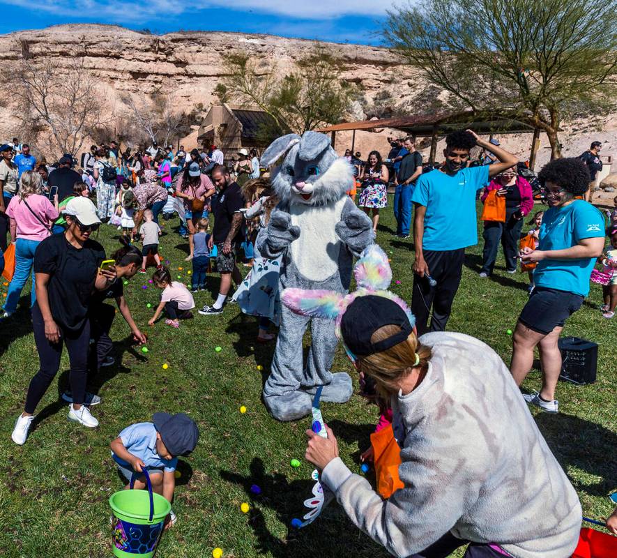 The Easter Bunny enjoys the moment as parents and their children ages 1-3 participate in their ...