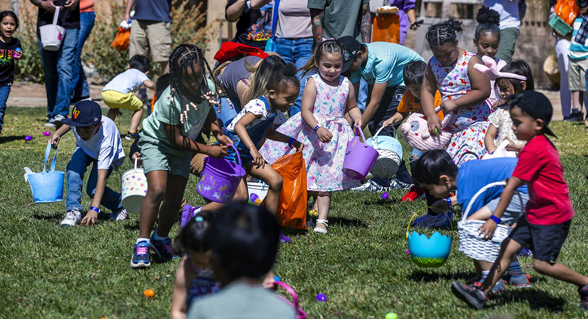 Children ages 4-7 gather up the eggs during the annual Spring Carnival at the Whitney Ranch Rec ...