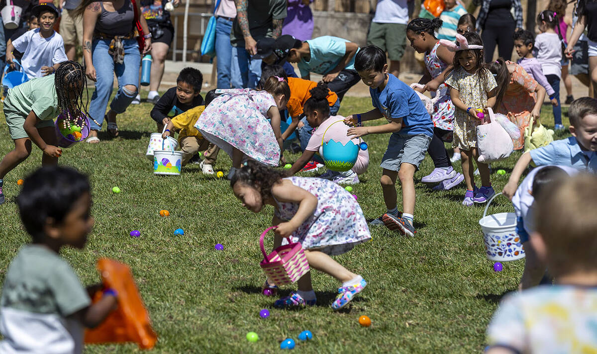 Children ages 4-7 gather up the eggs during the annual Spring Carnival at the Whitney Ranch Rec ...