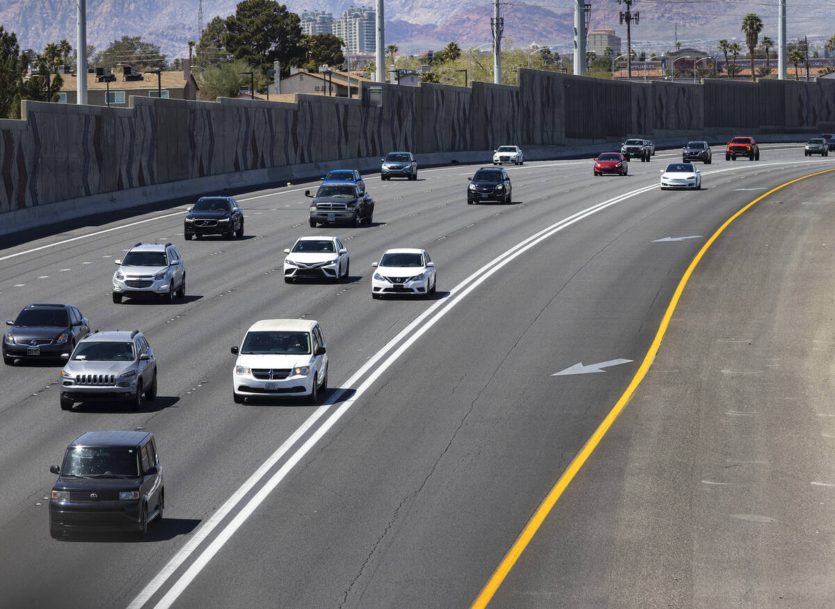 A carpool lane, right, is seen as motorist navigate on southbound Interstate 15, on Monday, Apr ...