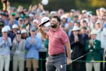 Jon Rahm, of Spain, celebrates on the 18th green after winning the Masters golf tournament at A ...