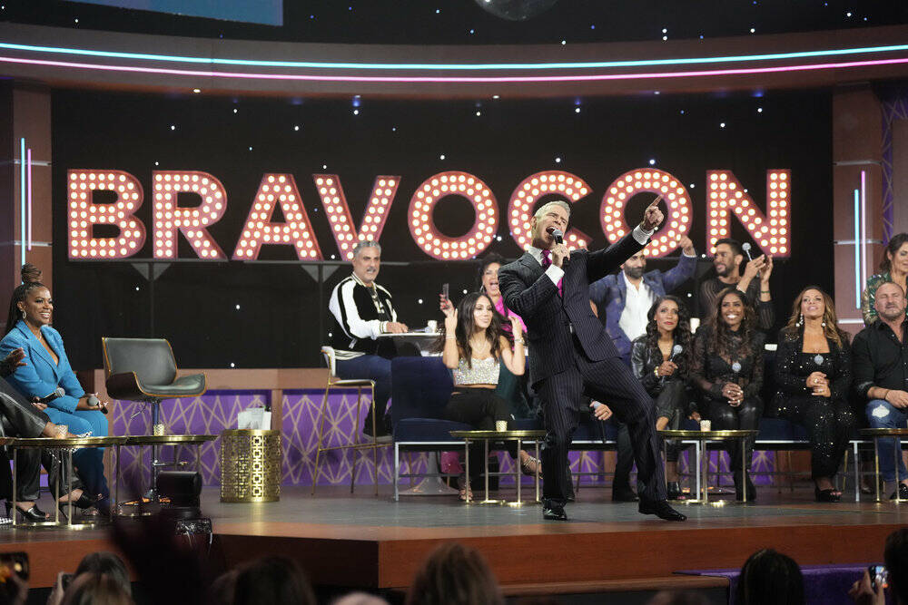 Andy Cohen and others are seen at a panel discussion during BravoCon in 2022. (Charles Sykes/Bravo)