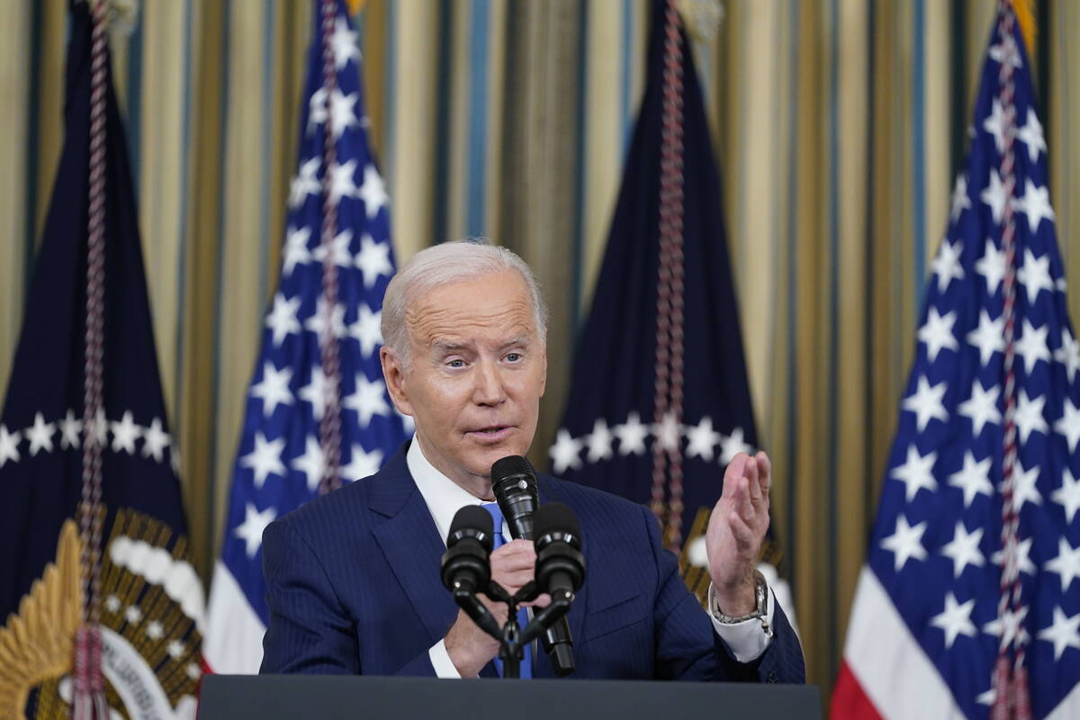 FILE - President Joe Biden speaks in the State Dining Room of the White House in Washington, We ...