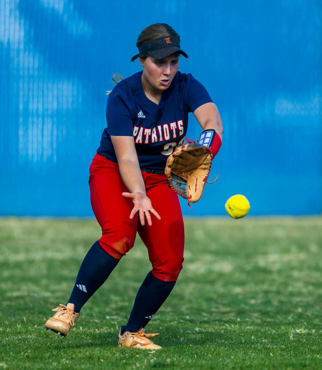 Centennial Liberty outfielder Morgyn Vesco looks to grab a grounder on another hit from Centen ...