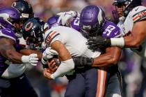 Minnesota Vikings linebacker Danielle Hunter (99) sacks Chicago Bears quarterback Justin Fields ...