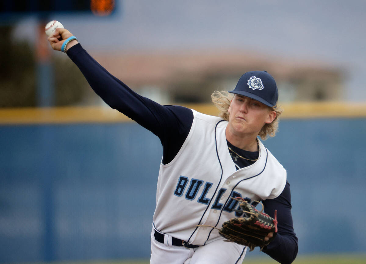 Centennial's pitcher Logan Smith (8) delivers during the first inning of a baseball game agains ...