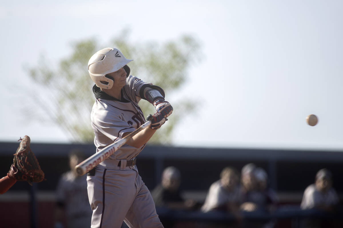 Cimarron-Memorial’s Travis DeMuth bats against Coronado during a high school baseball ga ...