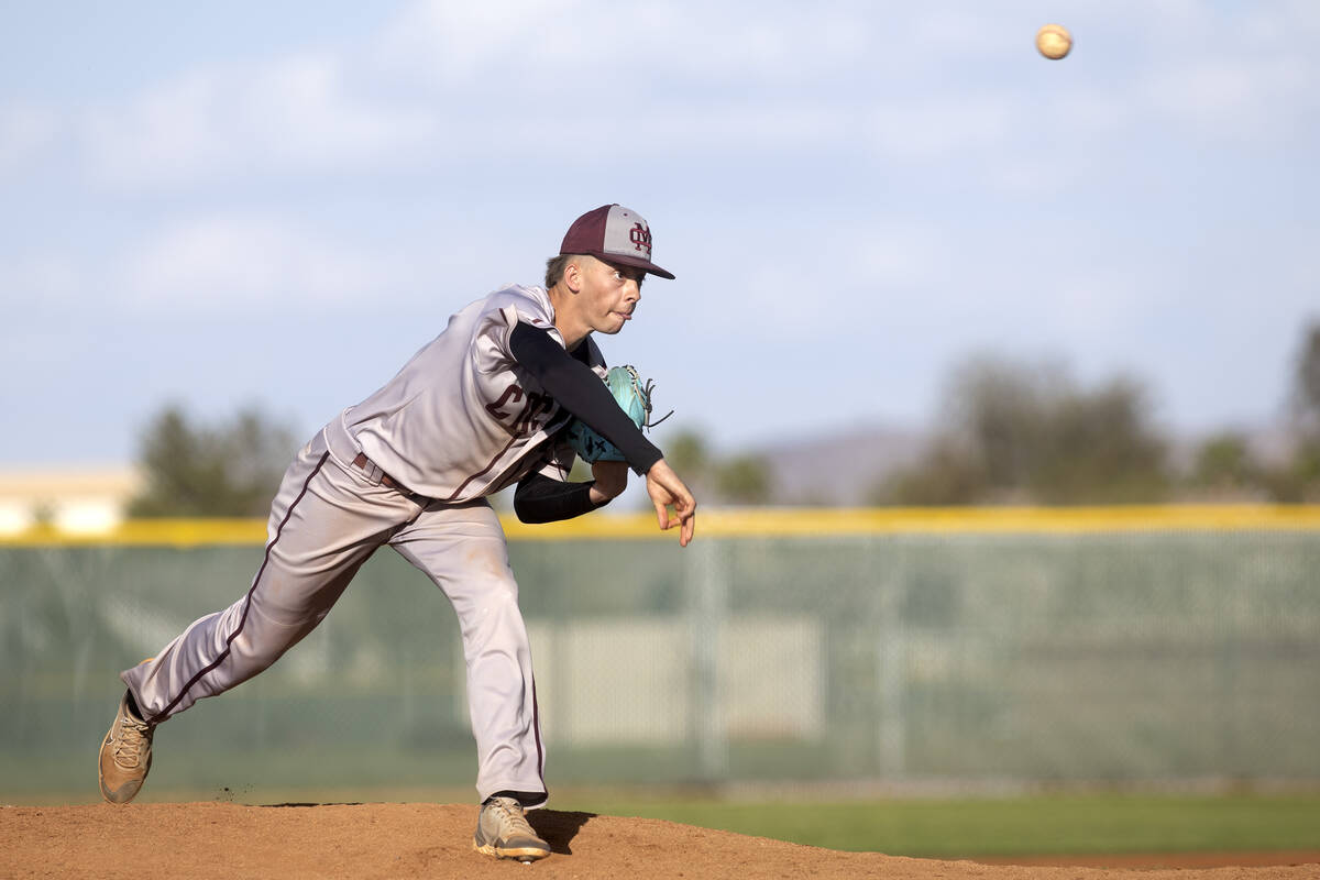 Cimarron-Memorial’s Phil Abbott throws to Coronado during a high school baseball game at ...