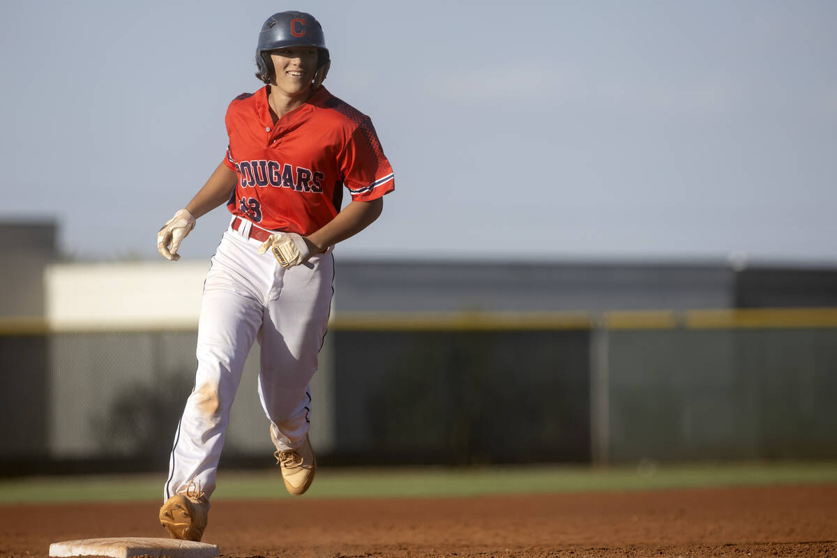Coronado’s Caden Hunt rounds third base after hitting a homer during a high school baseb ...