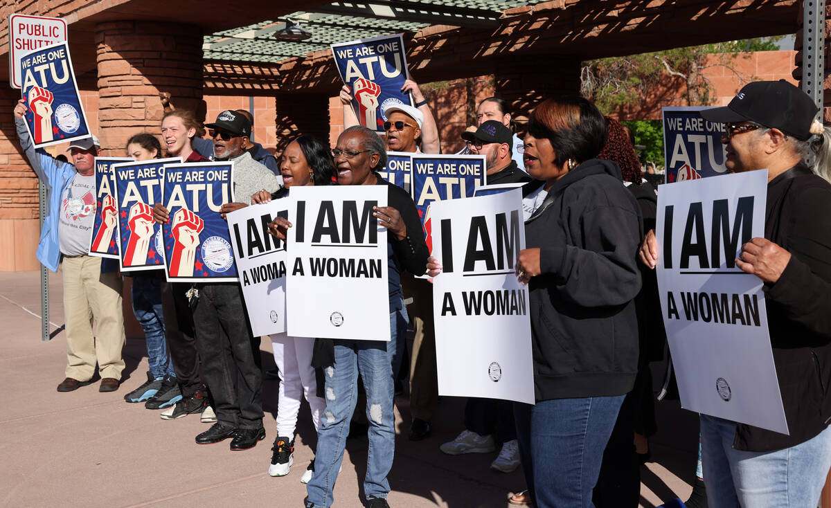 Members of the Amalgamated Transit Union, Local 1637, rally outside the Clark County Government ...