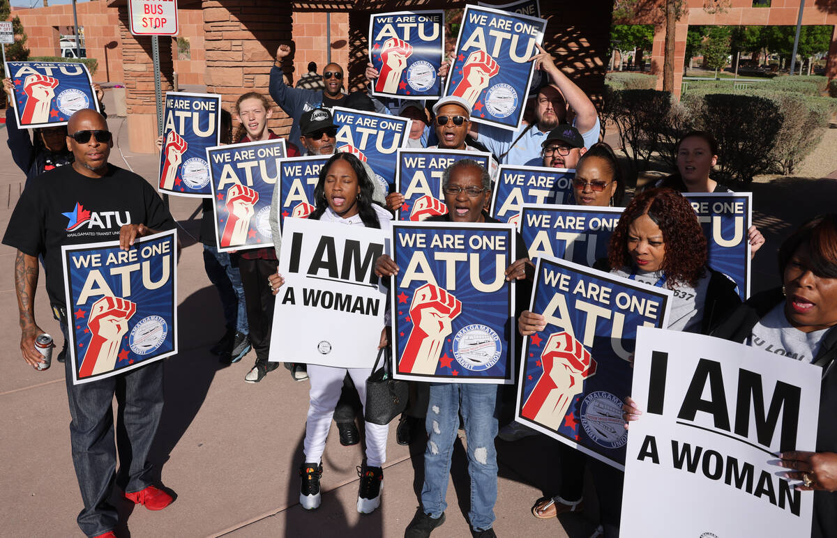 Members of the Amalgamated Transit Union, Local 1637, rally outside the Clark County Government ...