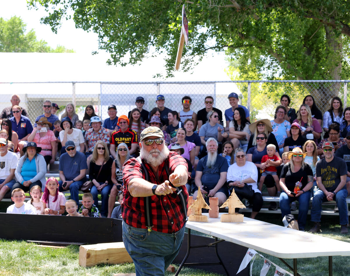Lee LeCaptain throws an ax at the Paul Bunyan Lumberjack Show at Clark County Fair and Rodeo in ...