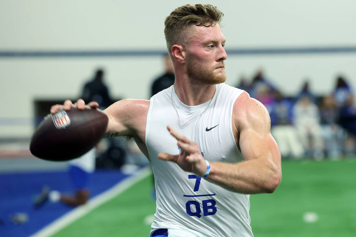 Kentucky's Will Levis throws a pass during the NCAA college football team's NFL Pro Day in Lexi ...