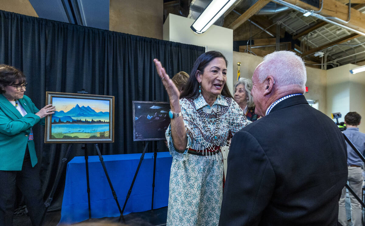 Department of Interior Secretary Deb Haaland congratulates longtime conservationist Alan O'Neil ...