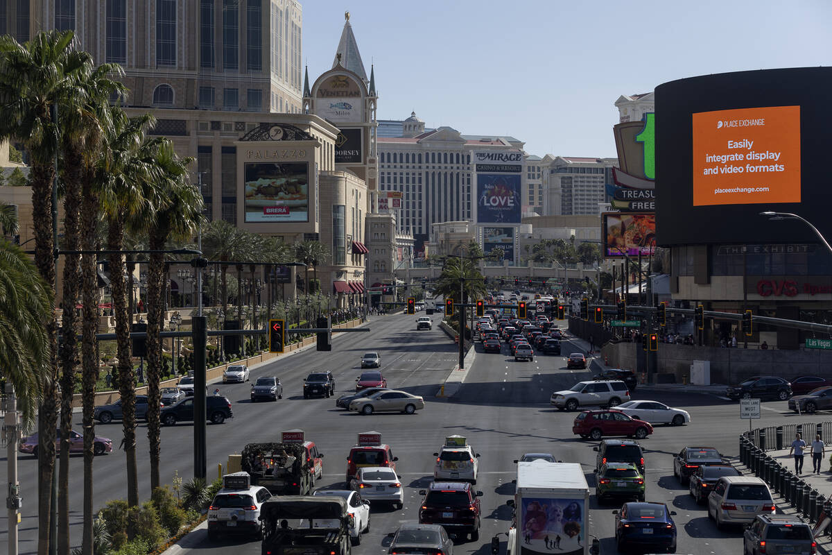 Traffic moves on Las Vegas Boulevard at Spring Mountain Road on Saturday, April 15, 2023, in La ...