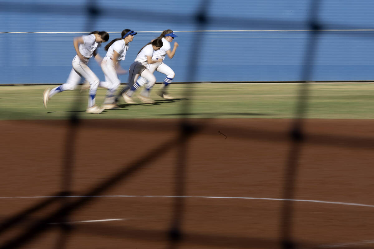 Bishop Gorman runs sprints after winning a high school softball game against Tech at Bishop Gor ...