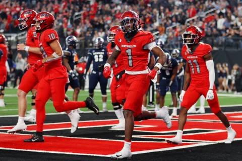 UNLV Rebels wide receiver Kyle Williams (1) reacts his touchdown catch in the first half of a N ...