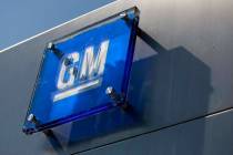 The General Motors logo is seen outside its headquarters at the Renaissance Center in Detroit, ...