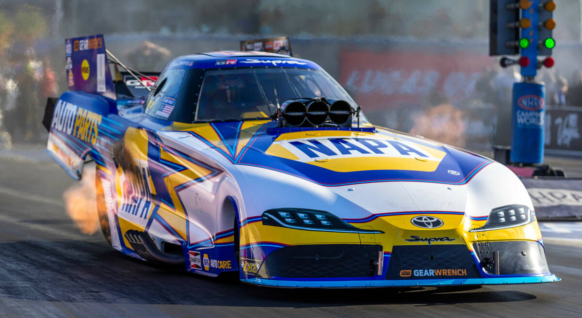 Funny Car driver Ron Capps leaves the start line on another qualifying race during Day 2 of NHR ...