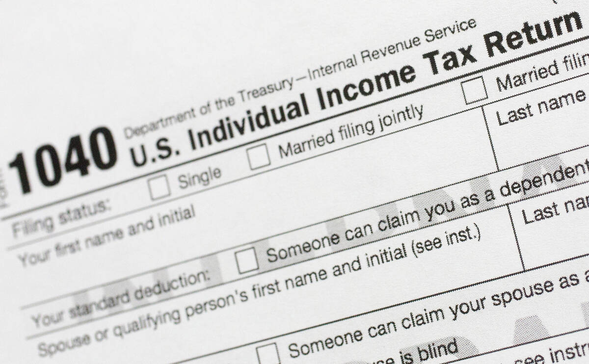 A portion of the 1040 U.S. Individual Income Tax Return form is shown July 24, 2018, in New Yor ...