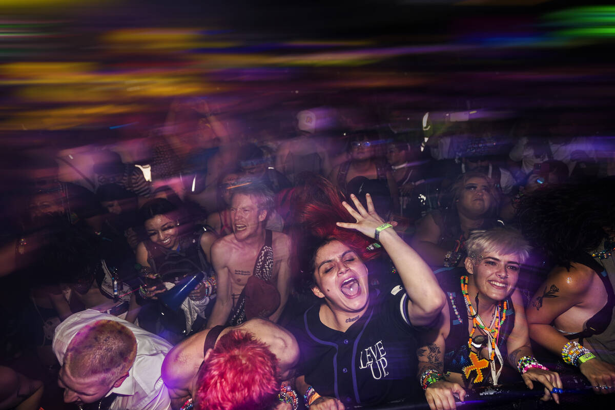 Attendees listen to music at Base Pod during day three of Electric Daisy Carnival on Sunday, Ma ...