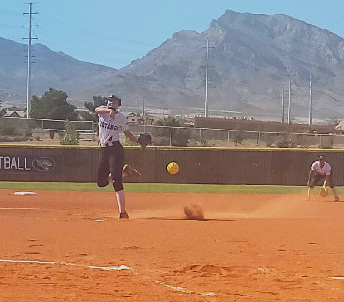 Shadow Ridge pitcher Josslin Law fires a pitch against Palo Verde on Tuesday, April 18, 2023, a ...