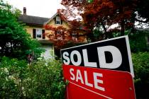 A sale sign stands outside a home in Wyndmoor, Pa., in 2022. (AP Photo/Matt Rourke)
