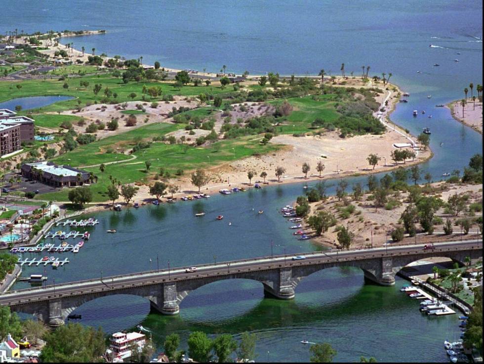 The London Bridge stands in the foreground with State Beach, behind, and Rotary Beach, around t ...