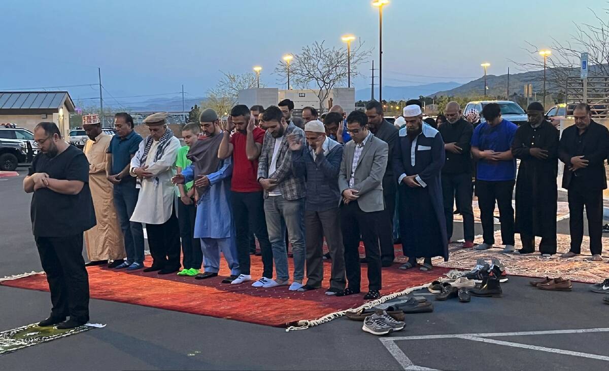 Muslim community members pray at the Summerlin Area Command for Laylat ul-Qadr, or Night of Pow ...
