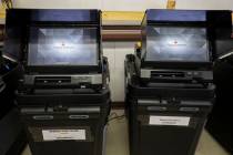 FILE - Dominion Voting ballot-counting machines are shown at a Torrance County warehouse during ...