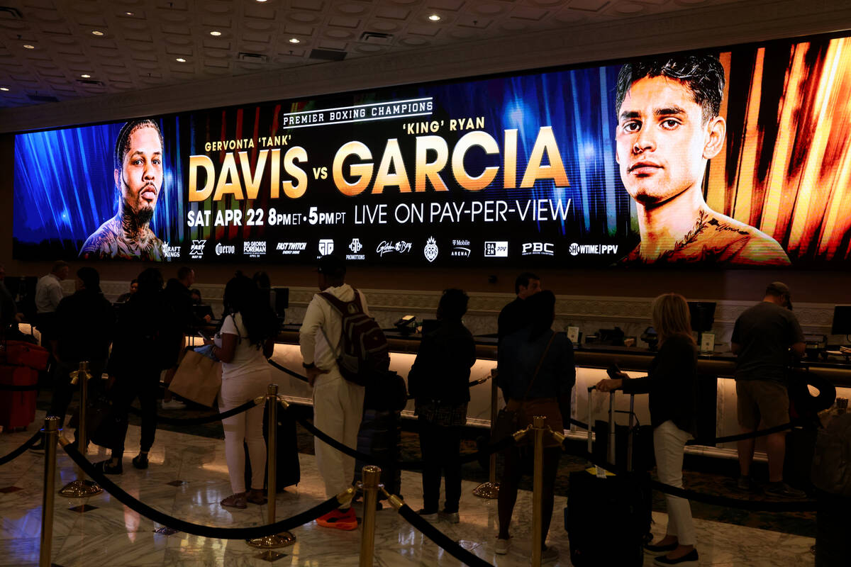 Hotel guests check in during the Gervonta Davis-Ryan Garcia grand arrivals event at MGM Grand T ...