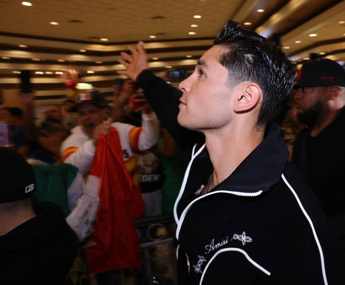 Fans cheer as Ryan Garcia makes his way to the stage during the grand arrivals event at MGM Gra ...